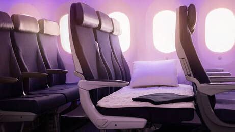 Skycouch vs Premium Economy for a couple .